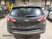 ✅ 2018 Chevrolet Equinox LS • VIN: 2GNAXREV4J6197117 • Lot: 85804864. Wystawiony na Copart z przebiegiem 55 865 mil. Bezpłatny archiwum sprzedaży aukcyjnych z USA i szczegółowy raport historii pojazdu na DreamBid. Zdjęcie 6.
