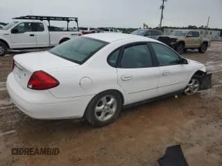 ✅ 2001 Ford Taurus SES • VIN: 1FAFP55U21G209219 • Lot: 68520334. Listed on Copart with 126,325 mi. Free auction sales archive from the USA and detailed vehicle history report at DreamBid. Image 3.