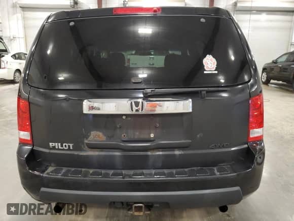 2010 Honda Pilot LX with VIN 5FNYF4H26AB031724, listed as a Copart auction lot 64199905 with 205,743 mi miles and Salvage title. Bid and sale history available at DreamBid. Image 6.