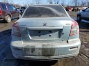 ✅ 2009 Suzuki SX4 Sport FWD • VIN: JS2YC414796200649 • Lot: 46269865. Listed on Copart with 154,495 mi. Free auction sales archive from the USA and detailed vehicle history report at DreamBid. Image 6.