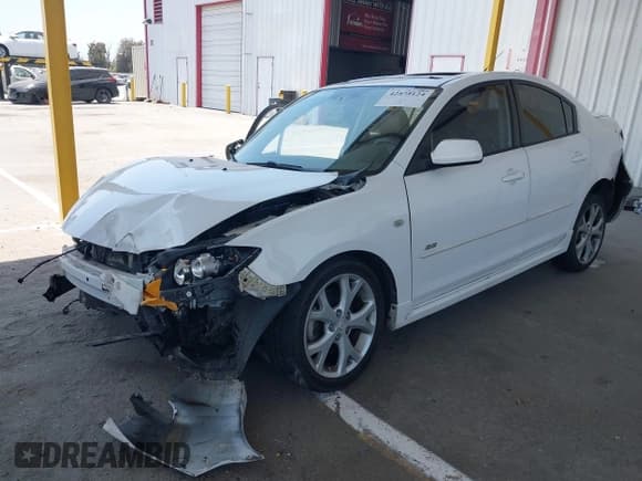 ✅ 2007 Mazda 3 S Touring • VIN: JM1BK324471663158 • Lot: 42575124. Wystawiony na IAAI z przebiegiem 160 938 mil. Bezpłatny archiwum sprzedaży aukcyjnych z USA i szczegółowy raport historii pojazdu na DreamBid. Zdjęcie 2.