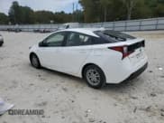 ✅ 2022 Toyota Prius LE • VIN: JTDKAMFU6N3182140 • Lot: 82677565. Wystawiony na Copart z przebiegiem 79 813 mil. Bezpłatny archiwum sprzedaży aukcyjnych z USA i szczegółowy raport historii pojazdu na DreamBid. Zdjęcie 2.