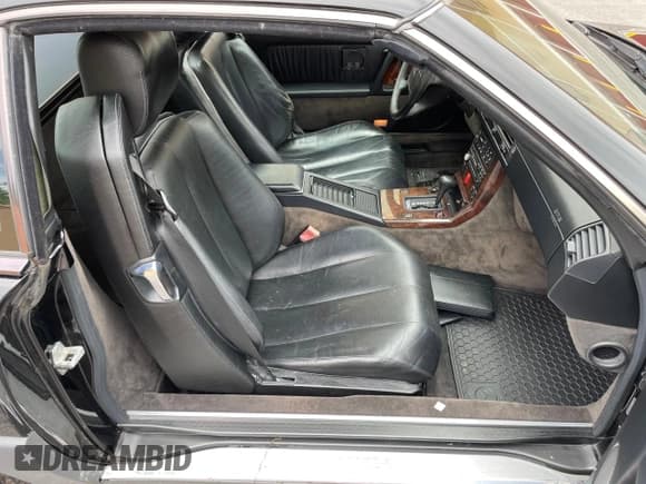 ✅ 1994 Mercedes-Benz SL 5.0L • VIN: WDBFA67E1RF102542 • Лот: 64461705. Опубликован ранее на Copart с пробегом 68 696 миль. Бесплатный доступ к архиву аукционных продаж из США и подробный отчёт об истории автомобиля на DreamBid. Изображение 5.