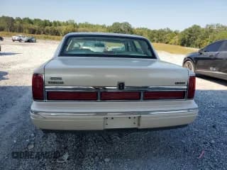 ✅ 1995 Lincoln Town Car Cartier • VIN: 1LNLM83W6SY751913 • Lot: 74940994. Listed on Copart with 70,459 mi. Free auction sales archive from the USA and detailed vehicle history report at DreamBid. Image 6.