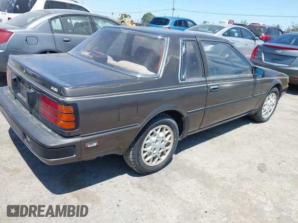 ✅ 1986 Nissan 200SX • VIN: JN1PS24S7GW112725 • Лот: 42533555. Опубликован ранее на IAAI с пробегом 74 240 миль. Бесплатный доступ к архиву аукционных продаж из США и подробный отчёт об истории автомобиля на DreamBid. Изображение 4.