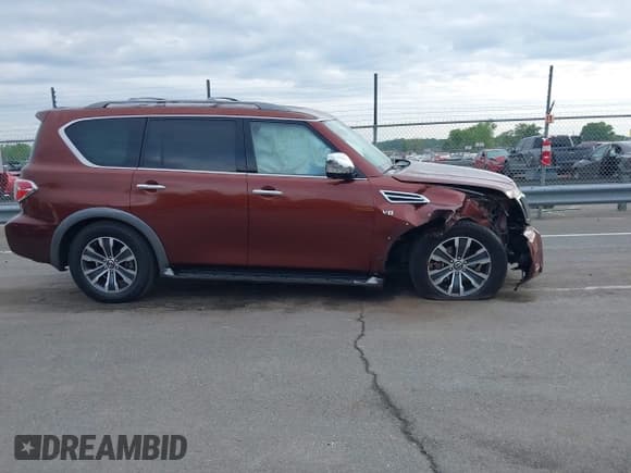 ✅ 2018 Nissan Armada SL • VIN: JN8AY2ND0J9052718 • Lot: 42088571. Listed on IAAI with 61,671 mi. Free auction sales archive from the USA and detailed vehicle history report at DreamBid. Image 13.