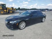 ✅ 2014 BMW 6 Series 650i xDrive • VIN: WBA6B4C52ED099145 • Лот: 68951295. Опубликован ранее на Copart с пробегом 83 933 миль. Бесплатный доступ к архиву аукционных продаж из США и подробный отчёт об истории автомобиля на DreamBid. Изображение 1.