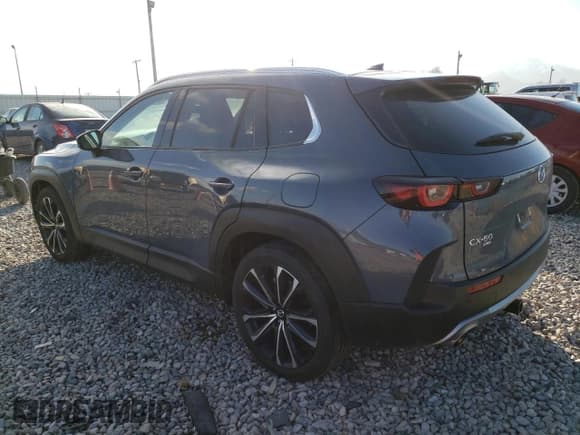 ✅ 2023 Mazda CX-50 Premium Plus • VIN: 7MMVABEY3PN106534 • Лот: 68754472. Опубликован ранее на Copart с пробегом 4 110 миль. Бесплатный доступ к архиву аукционных продаж из США и подробный отчёт об истории автомобиля на DreamBid. Изображение 2.