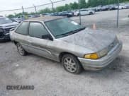 ✅ 1996 Ford Escort • VIN: 1FASP11J9TW180412 • Лот: 42259979. Опубликован ранее на IAAI с пробегом 159 169 миль. Бесплатный доступ к архиву аукционных продаж из США и подробный отчёт об истории автомобиля на DreamBid. Изображение 1.