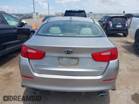 ✅ 2014 Kia Optima LX • VIN: 5XXGM4A79EG341389 • Lot: 42485986. Listed on IAAI with 101,302 mi. Free auction sales archive from the USA and detailed vehicle history report at DreamBid. Image 16.