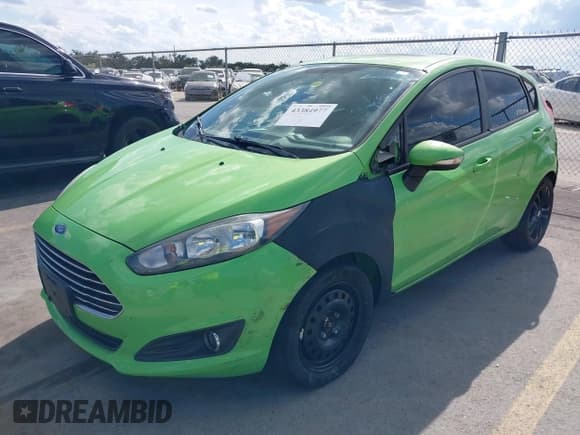 ✅ 2014 Ford Fiesta SE • VIN: 3FADP4EJ4EM189977 • Lot: 43384977. Wystawiony na IAAI z przebiegiem 137 690 mil. Bezpłatny archiwum sprzedaży aukcyjnych z USA i szczegółowy raport historii pojazdu na DreamBid. Zdjęcie 2.