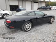 ✅ 2002 Jaguar XK • VIN: SAJDA41C92NA30185 • Lot: 84644315. Wystawiony na Copart z przebiegiem 100 625 mil. Bezpłatny archiwum sprzedaży aukcyjnych z USA i szczegółowy raport historii pojazdu na DreamBid. Zdjęcie 3.