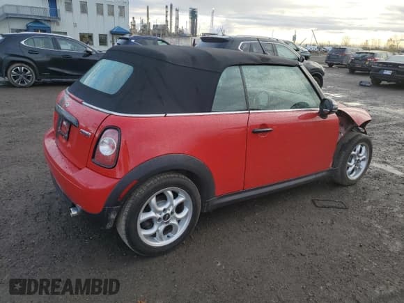 ✅ 2013 MINI Convertible • VIN: WMWZN3C55DT266195 • Лот: 89639905. Опубликован ранее на Copart с пробегом Не указан. Бесплатный доступ к архиву аукционных продаж из США и подробный отчёт об истории автомобиля на DreamBid. Изображение 3.