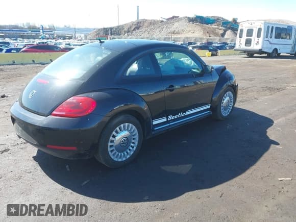 ✅ 2013 Volkswagen Beetle Fender Edition • VIN: 3VWJP7AT8DM685155 • Lot: 41815170. Listed on IAAI with 49,901 mi. Free auction sales archive from the USA and detailed vehicle history report at DreamBid. Image 4.