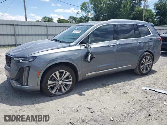 ✅ 2022 Cadillac XT6 Premium Luxury • VIN: 1GYKPCRSXNZ106107 • Lot: 55597655. Listed on Copart with 75,714 mi. Free auction sales archive from the USA and detailed vehicle history report at DreamBid. Image 1.