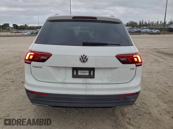 ✅ 2018 Volkswagen Tiguan S • VIN: 3VV1B7AX4JM079823 • Lot: 95833855. Listed on Copart with 66,522 mi. Free auction sales archive from the USA and detailed vehicle history report at DreamBid. Image 6.