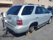 ✅ 2004 Acura MDX Touring • VIN: 2HNYD18904H544719 • Lot: 42907852. Wystawiony na IAAI z przebiegiem 16 738 mil. Bezpłatny archiwum sprzedaży aukcyjnych z USA i szczegółowy raport historii pojazdu na DreamBid. Zdjęcie 4.