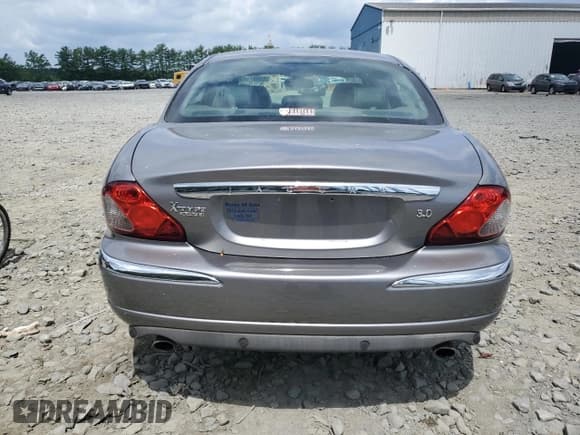 ✅ 2008 Jaguar X-Type • VIN: SAJWA51A48WJ36895 • Лот: 65097445. Опубликован ранее на Copart с пробегом 96 311 миль. Бесплатный доступ к архиву аукционных продаж из США и подробный отчёт об истории автомобиля на DreamBid. Изображение 6.