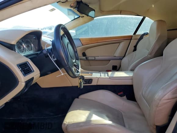 ✅ 2005 Aston Martin DB9 • VIN: SCFAD02A55GB03240 • Лот: 73351594. Опубликован ранее на Copart с пробегом Не указан. Бесплатный доступ к архиву аукционных продаж из США и подробный отчёт об истории автомобиля на DreamBid. Изображение 7.