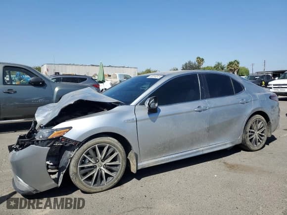 ✅ 2021 Toyota Camry Hybrid SE • VIN: 4T1G31AK3MU556406 • Lot: 80314515. Wystawiony na Copart z przebiegiem 26 256 mil. Bezpłatny archiwum sprzedaży aukcyjnych z USA i szczegółowy raport historii pojazdu na DreamBid. Zdjęcie 1.