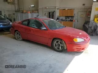 ✅ 2003 Pontiac Grand Am GT • VIN: 1G2NW12E43C103139 • Lot: 62676404. Wystawiony na Copart z przebiegiem 157 043 mil. Bezpłatny archiwum sprzedaży aukcyjnych z USA i szczegółowy raport historii pojazdu na DreamBid. Zdjęcie 4.