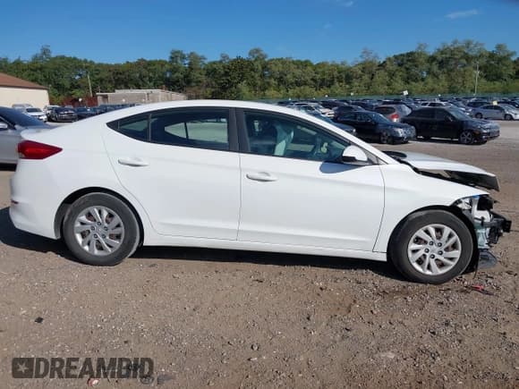 ✅ 2018 Hyundai Elantra SE • VIN: 5NPD74LF4JH290784 • Lot: 43383484. Listed on IAAI with 57,068 mi. Free auction sales archive from the USA and detailed vehicle history report at DreamBid. Image 14.