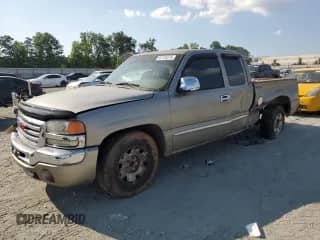 2003 GMC Sierra 1500 SLE with VIN 2GTEC19V131365927, listed as a Copart auction lot 62134075 with 323,414 mi miles and Salvage title. Bid and sale history available at DreamBid. Image 1.