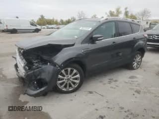✅ 2018 Ford Escape Titanium • VIN: 1FMCU0J9XJUD43869 • Лот: 90223335. Опубликован ранее на Copart с пробегом 101 004 миль. Бесплатный доступ к архиву аукционных продаж из США и подробный отчёт об истории автомобиля на DreamBid. Изображение 1.