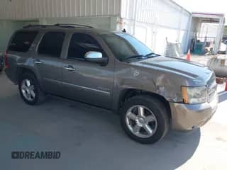 2011 Chevrolet Tahoe LTZ with VIN 1GNSCCE09BR333023, listed as a IAAI auction lot 43085215 with 165,616 mi miles and . Bid and sale history available at DreamBid. Image 1.