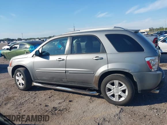 ✅ 2005 Chevrolet Equinox LT • VIN: 2CNDL73F256119499 • Лот: 41451287. Опубликован ранее на IAAI с пробегом 105 234 миль. Бесплатный доступ к архиву аукционных продаж из США и подробный отчёт об истории автомобиля на DreamBid. Изображение 14.