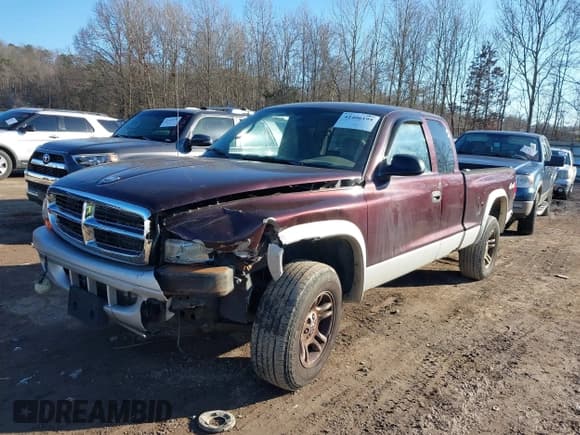 ✅ 2004 Dodge Dakota SLT • VIN: 1D7HG42N34S571352 • Лот: 41406195. Опубликован ранее на IAAI с пробегом 206 694 миль. Бесплатный доступ к архиву аукционных продаж из США и подробный отчёт об истории автомобиля на DreamBid. Изображение 2.