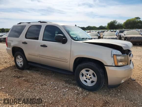 2007 Chevrolet Tahoe LS z VIN 1GNFC13067J203487, wystawiony jako Copart lot #69464065 z przebiegiem 239 918 mil mil oraz Szkoda całkowita • Salvage title. Historia ofert i sprzedaży dostępna na DreamBid. Obrazek 4.