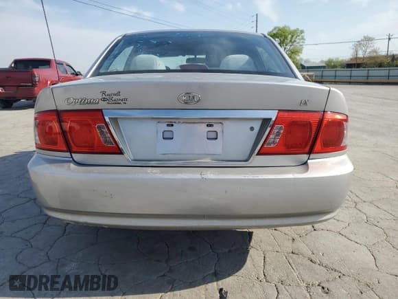 ✅ 2004 Kia Optima LX • VIN: KNAGD126045301139 • Lot: 52876615. Listed on Copart with 165,480 mi. Free auction sales archive from the USA and detailed vehicle history report at DreamBid. Image 6.