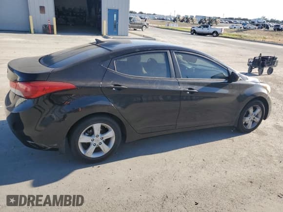 ✅ 2013 Hyundai Elantra GLS • VIN: KMHDH4AE9DU518582 • Lot: 67113925. Listed on Copart with 207,760 mi. Free auction sales archive from the USA and detailed vehicle history report at DreamBid. Image 3.