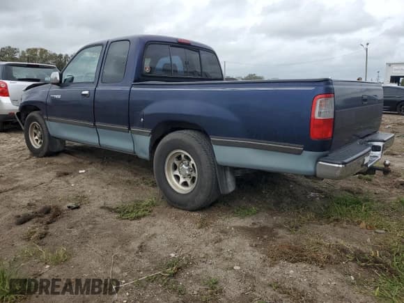 ✅ 1997 Toyota T100 DX • VIN: JT4TN12D7V0038238 • Lot: 79713824. Listed on Copart with 233,756 mi. Free auction sales archive from the USA and detailed vehicle history report at DreamBid. Image 2.