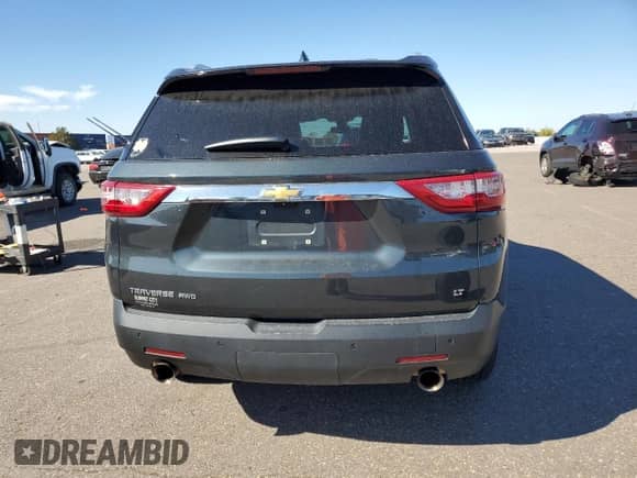 2018 Chevrolet Traverse LT z VIN 1GNEVHKW1JJ285026, wystawiony jako Copart lot #82348695 z przebiegiem 94 788 mil mil oraz Szkoda całkowita • Salvage title. Historia ofert i sprzedaży dostępna na DreamBid. Obrazek 6.