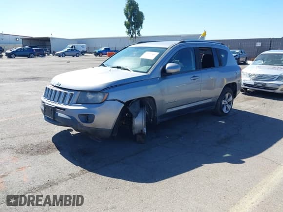✅ 2014 Jeep Compass Latitude • VIN: 1C4NJDEB4ED770674 • Lot: 43537441. Listed on IAAI with 169,190 mi. Free auction sales archive from the USA and detailed vehicle history report at DreamBid. Image 2.