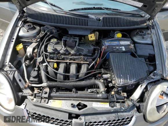 2005 Dodge Neon SXT z VIN 1B3ES56C65D260662, wystawiony jako Copart lot #49780575 z przebiegiem 184 036 mil mil oraz Szkoda całkowita • Salvage title. Historia ofert i sprzedaży dostępna na DreamBid. Obrazek 13.