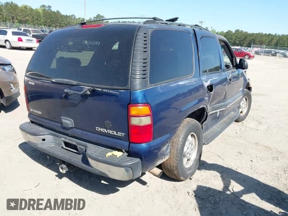 ✅ 2003 Chevrolet Tahoe LT • VIN: 1GNEC13Z13J280286 • Lot: 42010980. Listed on IAAI with Not provided. Free auction sales archive from the USA and detailed vehicle history report at DreamBid. Image 4.