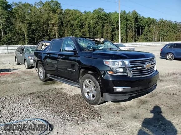 ✅ 2018 Chevrolet Suburban Premier • VIN: 1GNSCJKCXJR235829 • Lot: 74817724. Wystawiony na Copart z przebiegiem 90 067 mil. Bezpłatny archiwum sprzedaży aukcyjnych z USA i szczegółowy raport historii pojazdu na DreamBid. Zdjęcie 14.