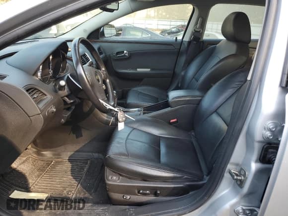 ✅ 2012 Chevrolet Malibu LTZ • VIN: 1G1ZG5E79CF288942 • Lot: 77530494. Listed on Copart with 135,863 mi. Free auction sales archive from the USA and detailed vehicle history report at DreamBid. Image 7.