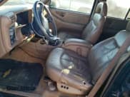 ✅ 1997 Chevrolet Blazer LS • VIN: 1GNDT13WXV2245874 • Lot: 41433485. Wystawiony na Copart z przebiegiem 166 564 mil. Bezpłatny archiwum sprzedaży aukcyjnych z USA i szczegółowy raport historii pojazdu na DreamBid. Zdjęcie 7.