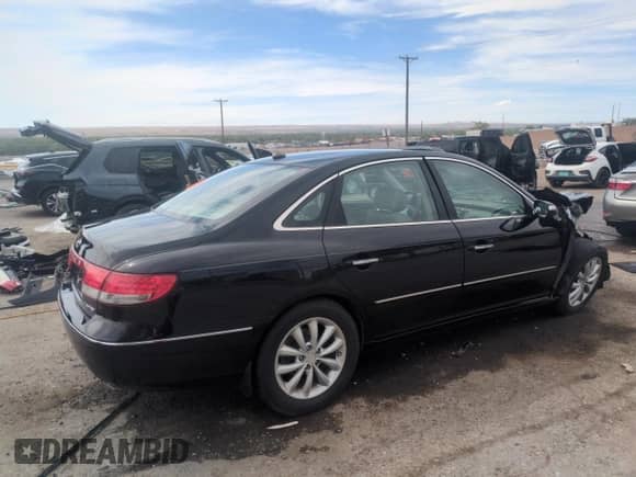 2008 Hyundai Azera Limited с VIN KMHFC46F68A252423, выставлен на аукционе Copart как лот 53674855 с пробегом 57 747 миль миль и На запчасти • Non repairable. История ставок и продаж доступна на DreamBid. Изображение 3.