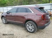 ✅ 2022 Cadillac XT5 FWD Premium Luxury • VIN: 1GYKNCR40NZ127684 • Lot: 55342065. Listed on Copart with 27,754 mi. Free auction sales archive from the USA and detailed vehicle history report at DreamBid. Image 2.