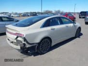 ✅ 2014 Lincoln MKZ • VIN: 3LN6L2G9XER820400 • Lot: 42195277. Wystawiony na IAAI z przebiegiem 48 597 mil. Bezpłatny archiwum sprzedaży aukcyjnych z USA i szczegółowy raport historii pojazdu na DreamBid. Zdjęcie 4.