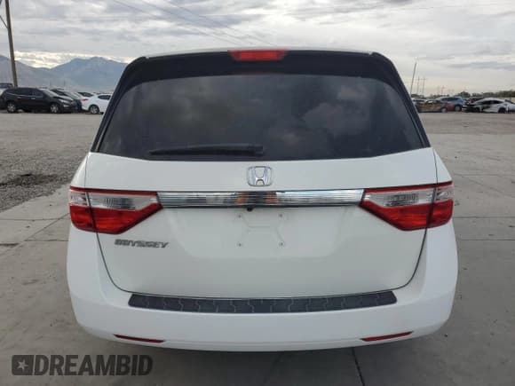 ✅ 2013 Honda Odyssey LX • VIN: 5FNRL5H2XDB082747 • Lot: 80600695. Listed on Copart with 110,873 mi. Free auction sales archive from the USA and detailed vehicle history report at DreamBid. Image 6.