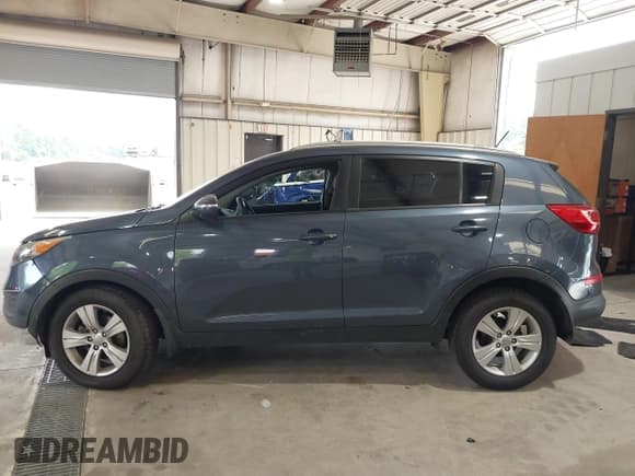 ✅ 2012 Kia Sportage LX • VIN: KNDPB3A25C7330111 • Лот: 42873656. Опубликован ранее на IAAI с пробегом 146 183 миль. Бесплатный доступ к архиву аукционных продаж из США и подробный отчёт об истории автомобиля на DreamBid. Изображение 14.