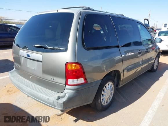 ✅ 2000 Ford Windstar LX • VIN: 2FMZA5145YBA12427 • Lot: 41990471. Wystawiony na IAAI z przebiegiem 97 069 mil. Bezpłatny archiwum sprzedaży aukcyjnych z USA i szczegółowy raport historii pojazdu na DreamBid. Zdjęcie 4.