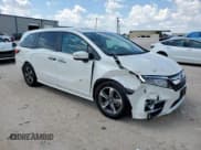 ✅ 2019 Honda Odyssey Touring • VIN: 5FNRL6H82KB005409 • Лот: 71223075. Опубликован ранее на Copart с пробегом 101 712 миль. Бесплатный доступ к архиву аукционных продаж из США и подробный отчёт об истории автомобиля на DreamBid. Изображение 4.
