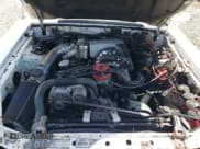 ✅ 1991 Ford Mustang • VIN: 1FACP44M4MF153969 • Lot: 57260195. Wystawiony na Copart z przebiegiem 115 147 mil. Bezpłatny archiwum sprzedaży aukcyjnych z USA i szczegółowy raport historii pojazdu na DreamBid. Zdjęcie 11.